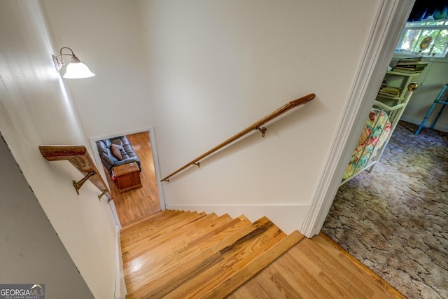 2000 Campbell Rd, Covington, GA 30014 - stairway featuring wood finished floors