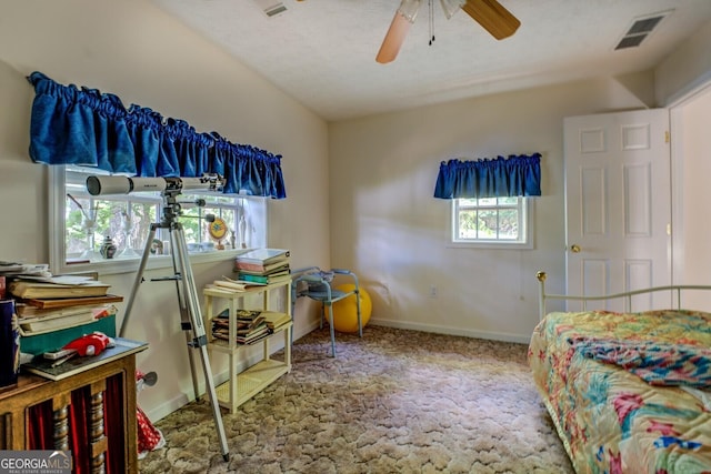2000 Campbell Rd, Covington, GA 30014 - carpeted bedroom featuring baseboards and a ceiling fan