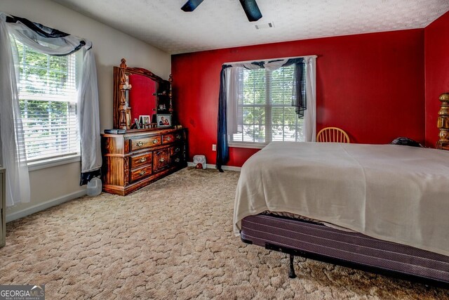 2000 Campbell Rd, Covington, GA 30014 - bedroom with carpet floors and ceiling fan