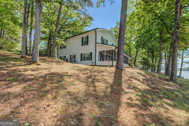 2000 Campbell Rd, Covington, GA 30014 - rear view of property featuring a sunroom