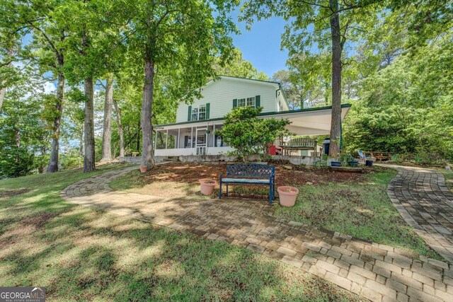 2000 Campbell Rd, Covington, GA 30014 - back of house with a yard