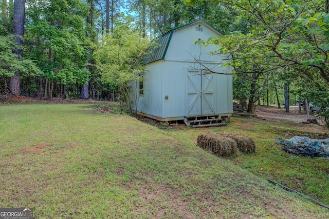 2000 Campbell Rd, Covington, GA 30014 - view of grassy yard featuring a storage shed
