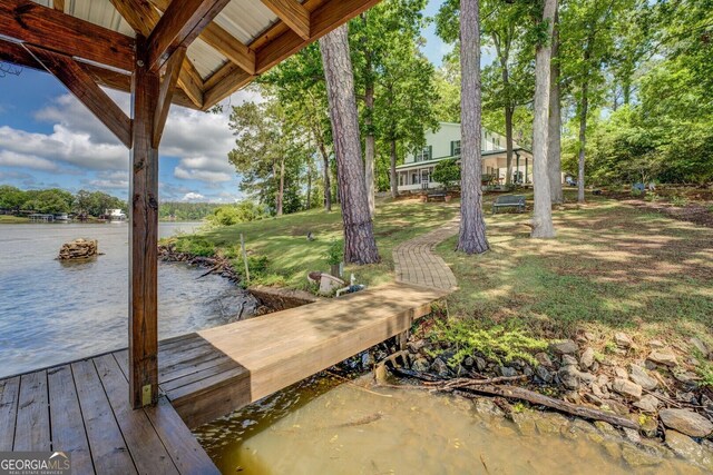 2000 Campbell Rd, Covington, GA 30014 - dock area featuring a water view and a yard