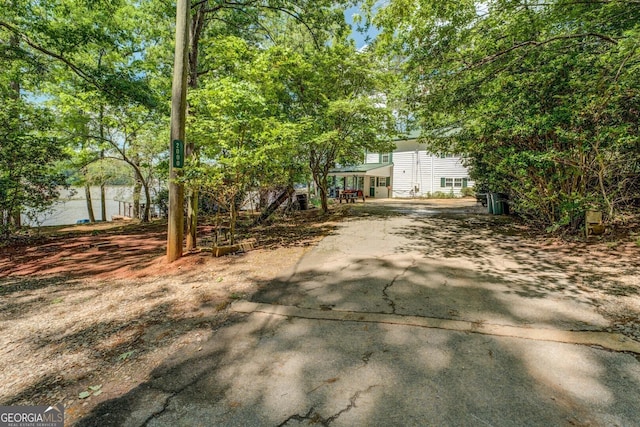 2000 Campbell Rd, Covington, GA 30014 - view of property hidden behind natural elements featuring driveway