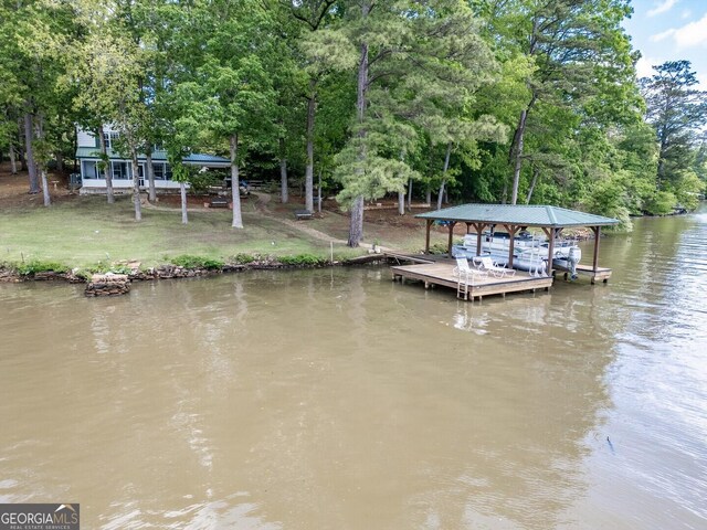 2000 Campbell Rd, Covington, GA 30014 - dock area featuring a water view, a yard, boat lift, and view of scattered trees
