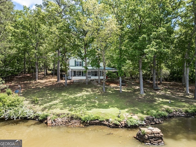2000 Campbell Rd, Covington, GA 30014 - rear view of property with a yard and a water view