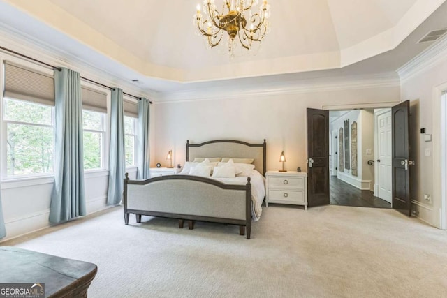 bedroom with ornamental molding, carpet flooring, a chandelier, and visible vents