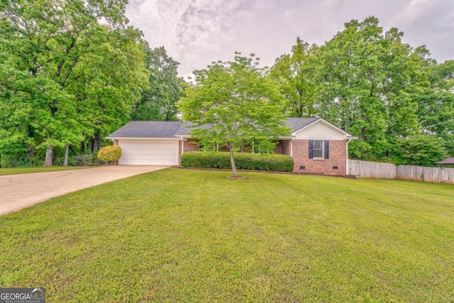 ranch-style house with brick siding, fence, a garage, driveway, and crawl space