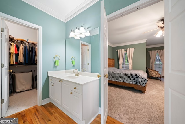 122 Woodstream Pt, Big Canoe, GA 30143 - bathroom with vanity, ornamental molding, connected bathroom, and a ceiling fan