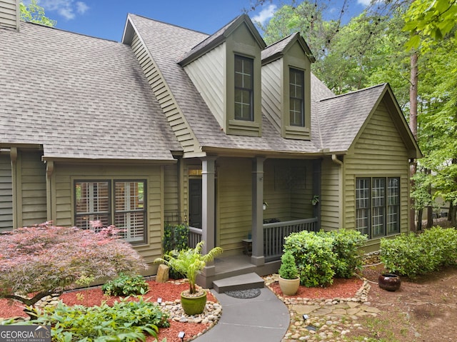 122 Woodstream Pt, Big Canoe, GA 30143 - view of front of home with a porch and a shingled roof