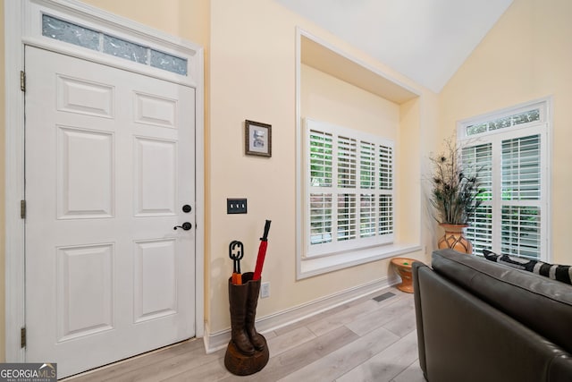 122 Woodstream Pt, Big Canoe, GA 30143 - entrance foyer featuring light wood-type flooring, baseboards, lofted ceiling, and visible vents