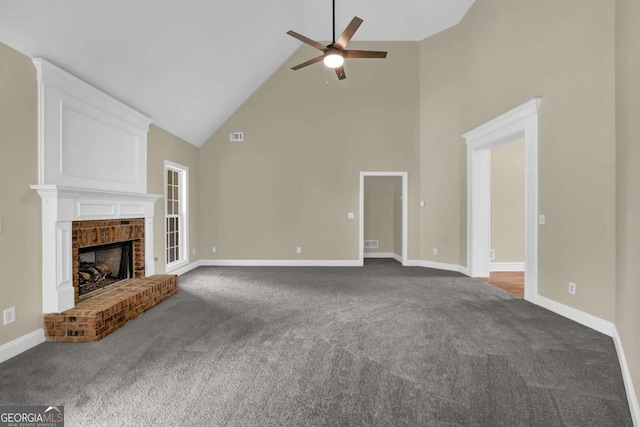 unfurnished living room with a ceiling fan, a fireplace, high vaulted ceiling, baseboards, and carpet floors