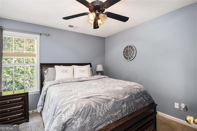 10 Callaway Ct, Hiram, GA 30141 - bedroom featuring carpet floors, baseboards, a textured ceiling, and ceiling fan