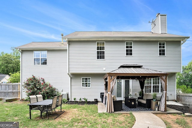 10 Callaway Ct, Hiram, GA 30141 - rear view of property with an outdoor living space, a gazebo, a chimney, a patio area, and central air condition unit