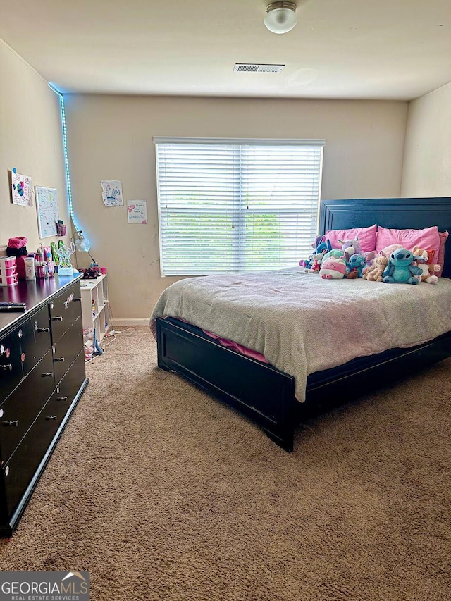 573 Emporia Loop, Mcdonough, GA 30253 - carpeted bedroom with visible vents and baseboards