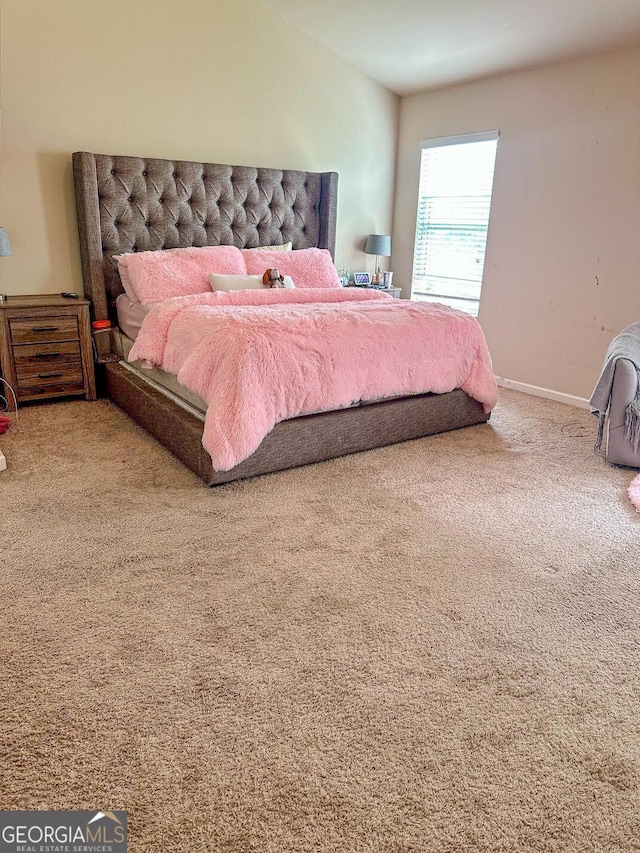 573 Emporia Loop, Mcdonough, GA 30253 - bedroom with baseboards, carpet, and vaulted ceiling