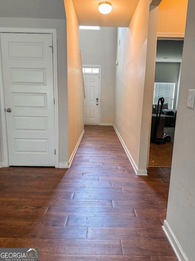 573 Emporia Loop, Mcdonough, GA 30253 - corridor featuring dark wood-style floors and baseboards