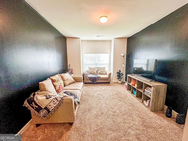 573 Emporia Loop, Mcdonough, GA 30253 - carpeted living room with baseboards and visible vents