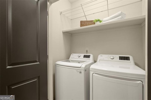 719 Hammond Dr, Woodstock, GA 30188 - laundry area featuring washing machine and dryer