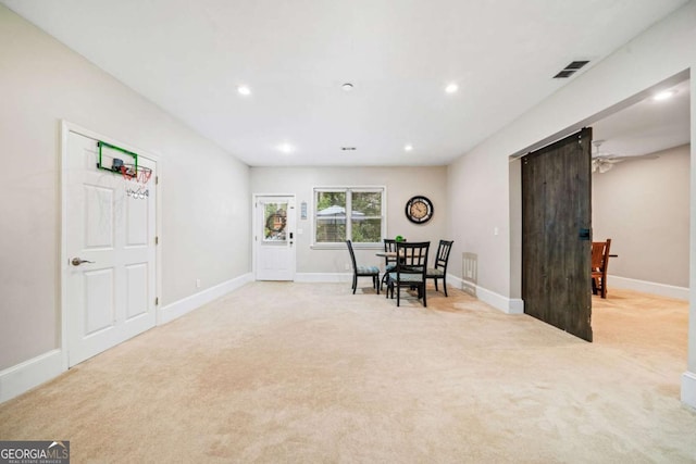 living area featuring carpet floors, recessed lighting, baseboards, and visible vents
