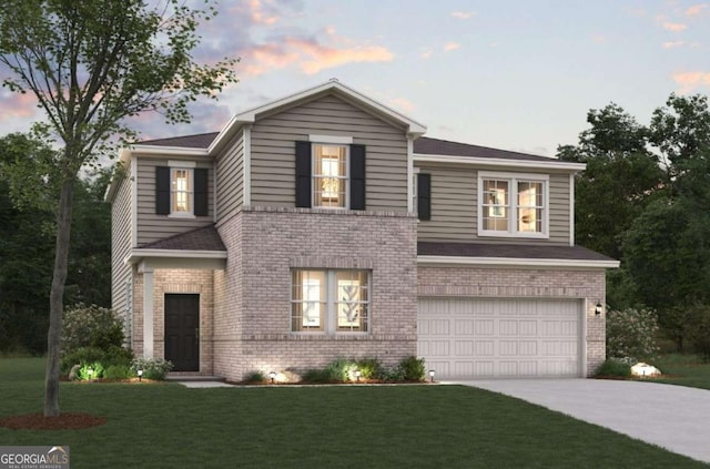 traditional home featuring a yard, brick siding, driveway, roof with shingles, and an attached garage