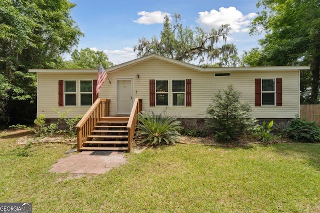 1293 Lake Dr, Midway, GA 31320 - manufactured / mobile home featuring crawl space and a front yard