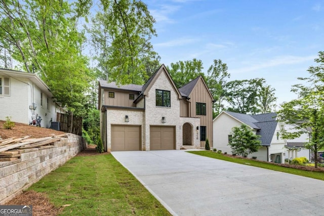 french provincial home with brick siding, board and batten siding, driveway, and an attached garage