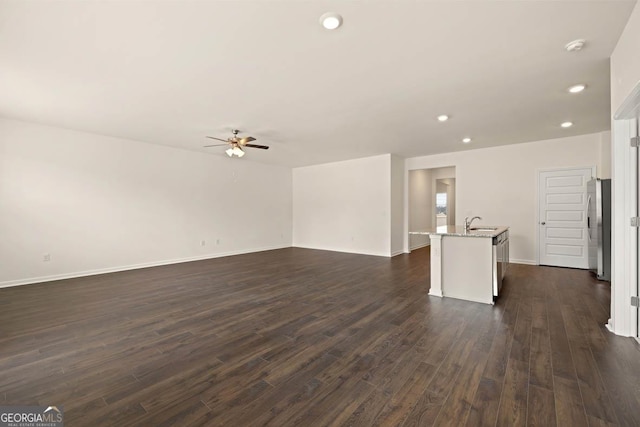 1400 Adirondac Way, Bonaire, GA 31005 - unfurnished living room with a sink, recessed lighting, ceiling fan, and dark wood finished floors