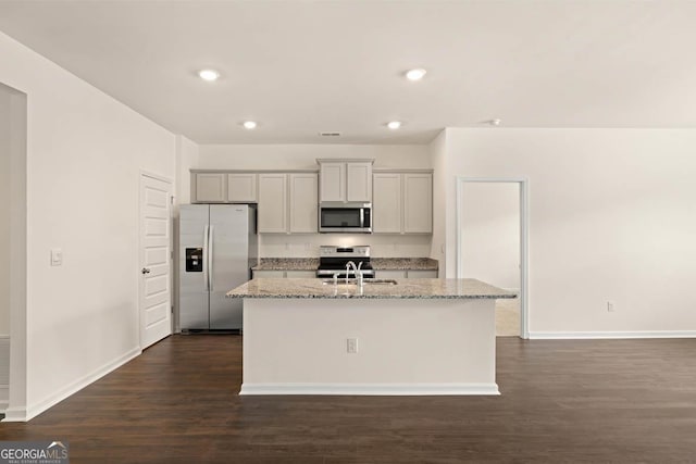 1400 Adirondac Way, Bonaire, GA 31005 - kitchen with a sink, dark wood-style flooring, appliances with stainless steel finishes, and a center island with sink