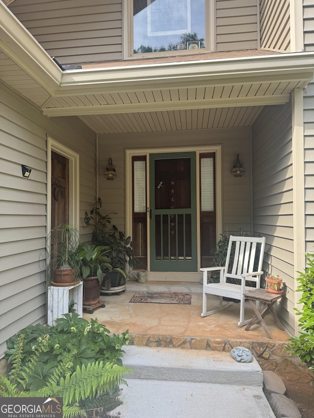 1685 Bailey Creek Rd SW, Conyers, GA 30094 - view of exterior entry featuring covered porch