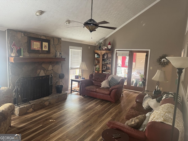 1685 Bailey Creek Rd SW, Conyers, GA 30094 - living area with crown molding, a fireplace, a textured ceiling, a ceiling fan, and wood finished floors