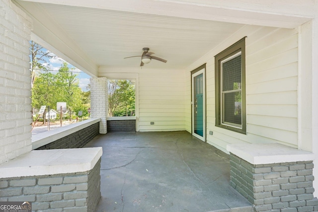 view of patio featuring ceiling fan