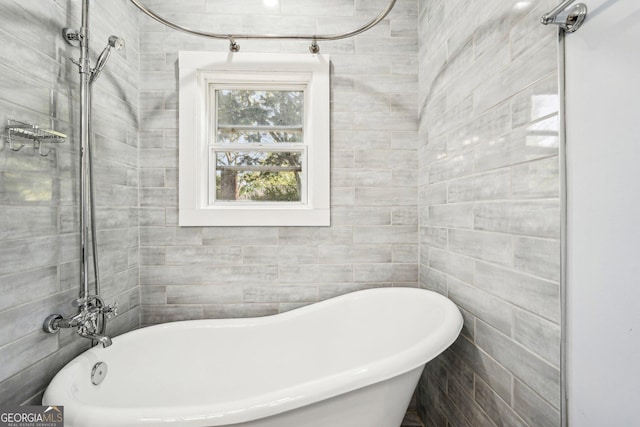 full bath with a soaking tub