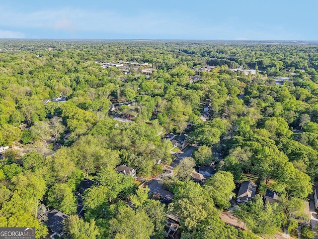 bird's eye view featuring a view of trees