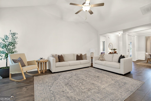 living room featuring visible vents, a ceiling fan, dark wood-style flooring, and vaulted ceiling