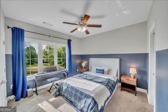 205 River Forest Dr, Forsyth, GA 31029 - carpeted bedroom featuring baseboards, ceiling fan, and visible vents