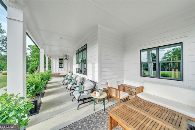 205 River Forest Dr, Forsyth, GA 31029 - view of patio with a porch