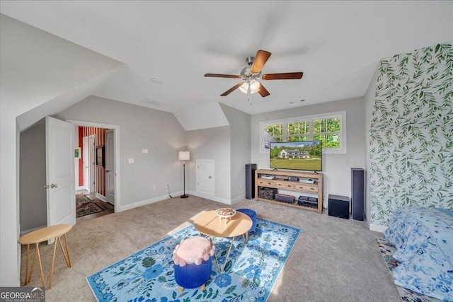 205 River Forest Dr, Forsyth, GA 31029 - living area with vaulted ceiling, baseboards, carpet, and a ceiling fan