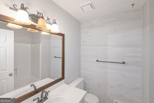 304 N Briar Rdg, Woodstock, GA 30189 - bathroom featuring toilet, a textured ceiling, visible vents, and vanity
