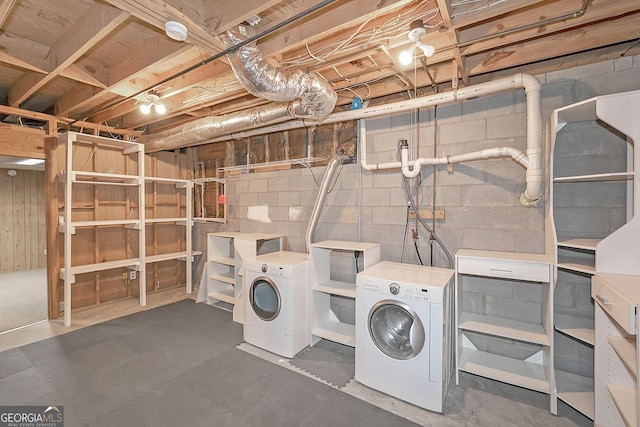 304 N Briar Rdg, Woodstock, GA 30189 - laundry area featuring washing machine and clothes dryer, concrete block wall, and laundry area