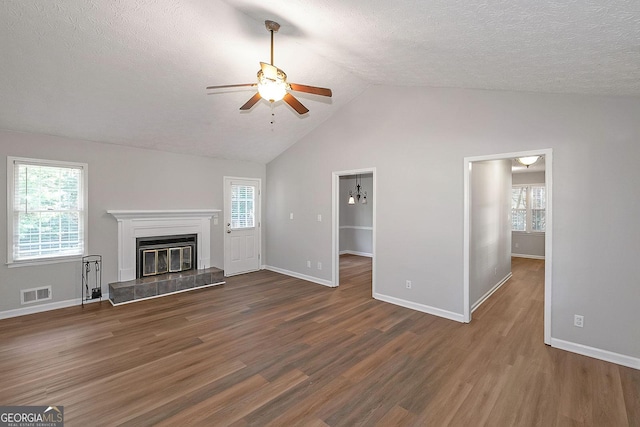304 N Briar Rdg, Woodstock, GA 30189 - unfurnished living room with visible vents, a glass covered fireplace, wood finished floors, baseboards, and a ceiling fan