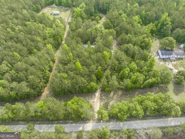 2140 Nesmith Rd SW, Gordon, GA 31031 - drone / aerial view of a heavily wooded area