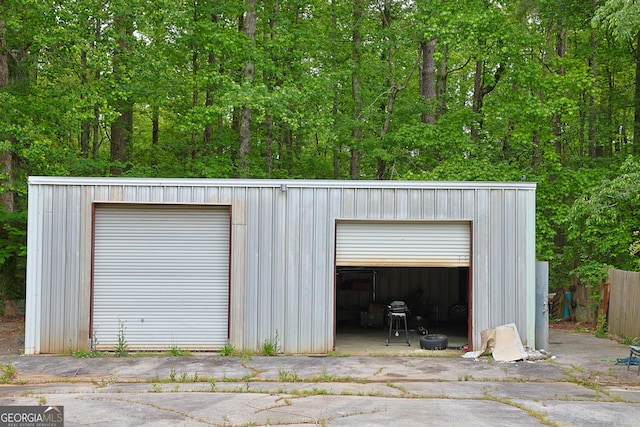 detached garage with fence
