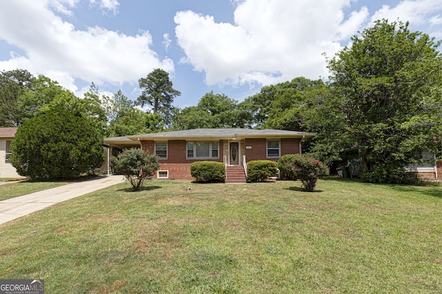 ranch-style house with concrete driveway, a front lawn, an attached carport, and brick siding