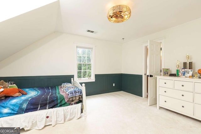 3380 Hill Forest Trl NW, Acworth, GA 30101 - bedroom with visible vents, wainscoting, lofted ceiling, and light carpet
