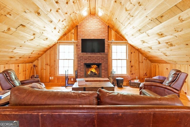3380 Hill Forest Trl NW, Acworth, GA 30101 - living area featuring wood finished floors, wood walls, lofted ceiling, and wooden ceiling