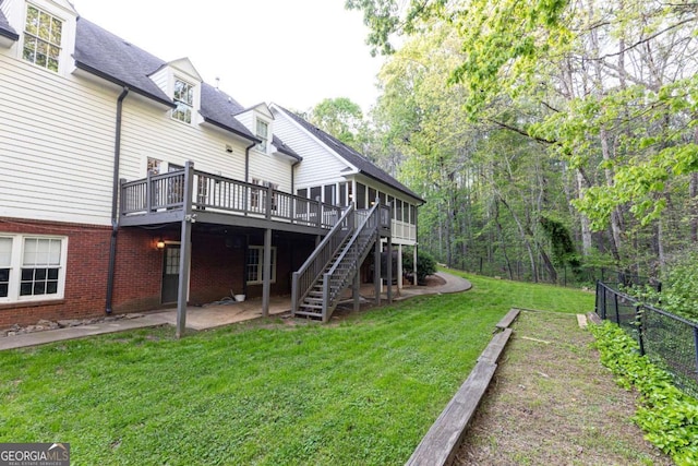 3380 Hill Forest Trl NW, Acworth, GA 30101 - rear view of house with fence, a shingled roof, a wooden deck, stairway, and a yard