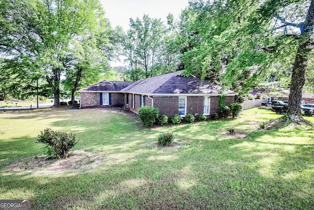 7415 Sierra Dr, Columbus, GA 31904 - view of yard featuring fence