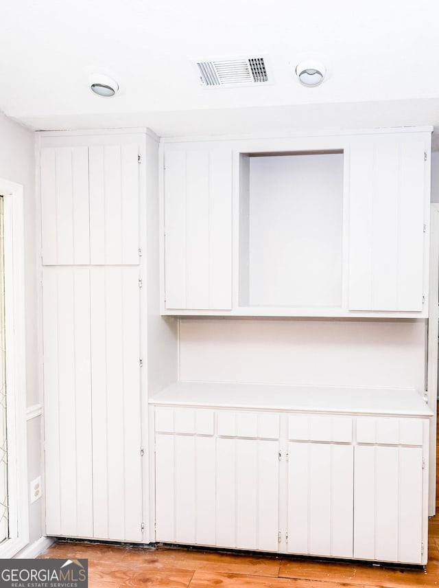 7415 Sierra Dr, Columbus, GA 31904 - room details with visible vents and wood finished floors