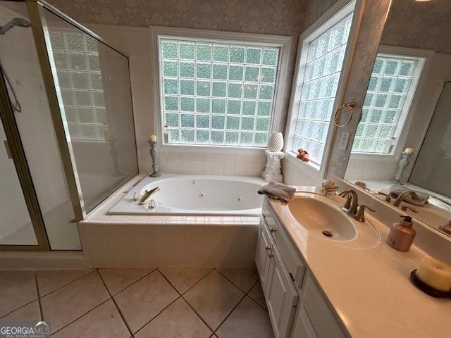 4665 Oakmont Bend Dr, Alpharetta, GA 30004 - full bathroom featuring a shower stall, vanity, a jetted tub, and tile patterned flooring